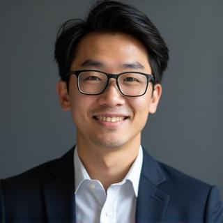 リードスタイリスト田中健二氏の顔写真